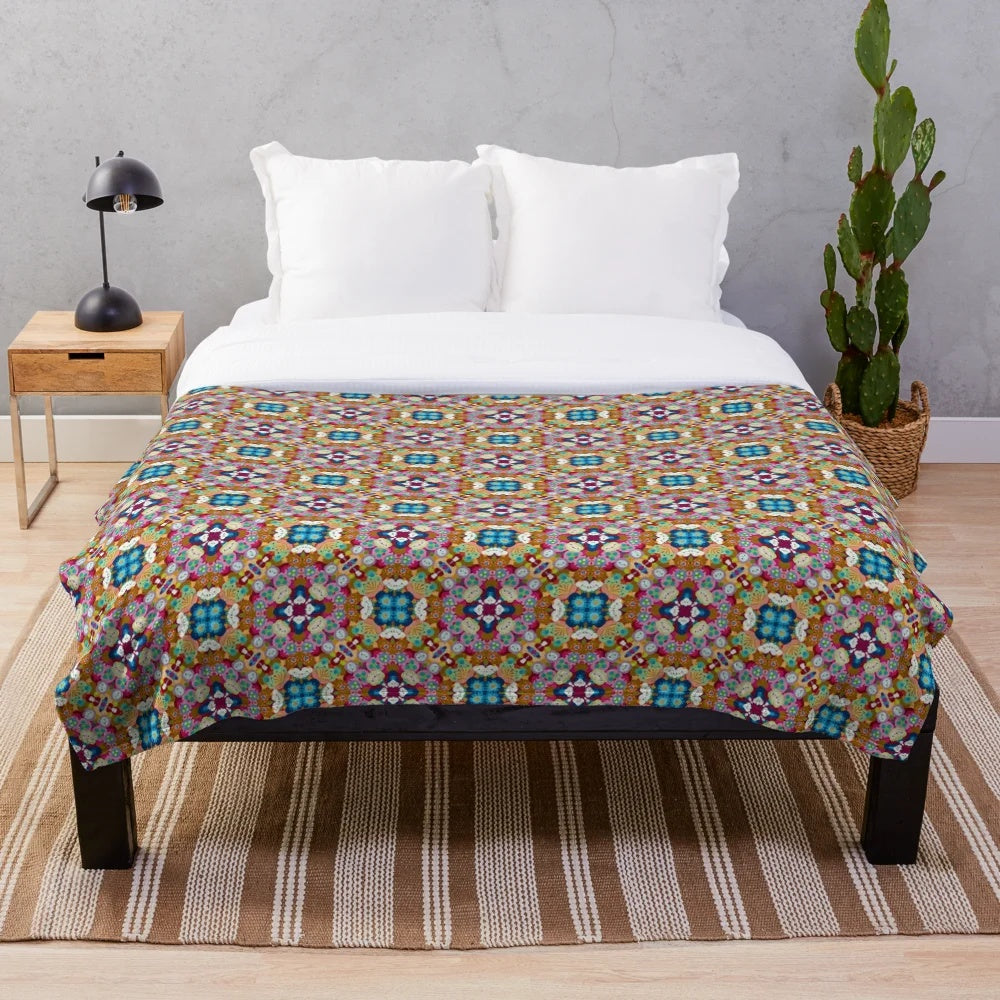 Patterned plush blanket with a variety of designs