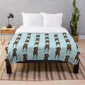 Chocolate Doberman with natural ears featured on a cute cartoon dog art plush blanket