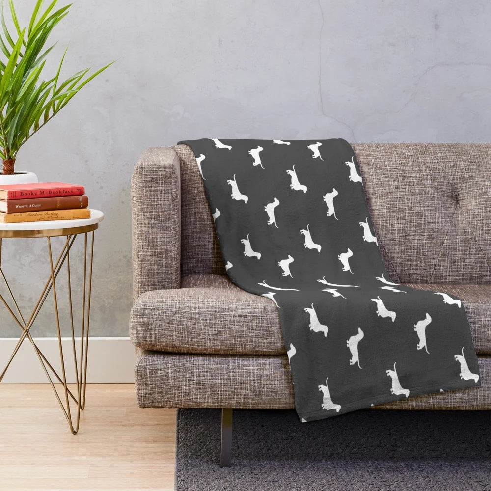 Dachshund silhouette plush blanket featuring a smooth coated doxie or wiener dog design