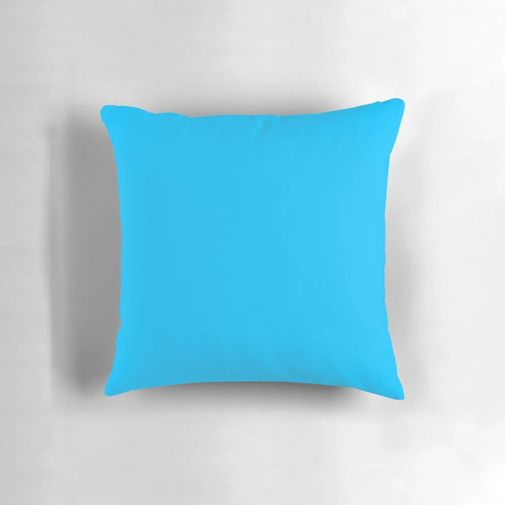 Deep sky blue solid color pillow with a plain, monochrome design