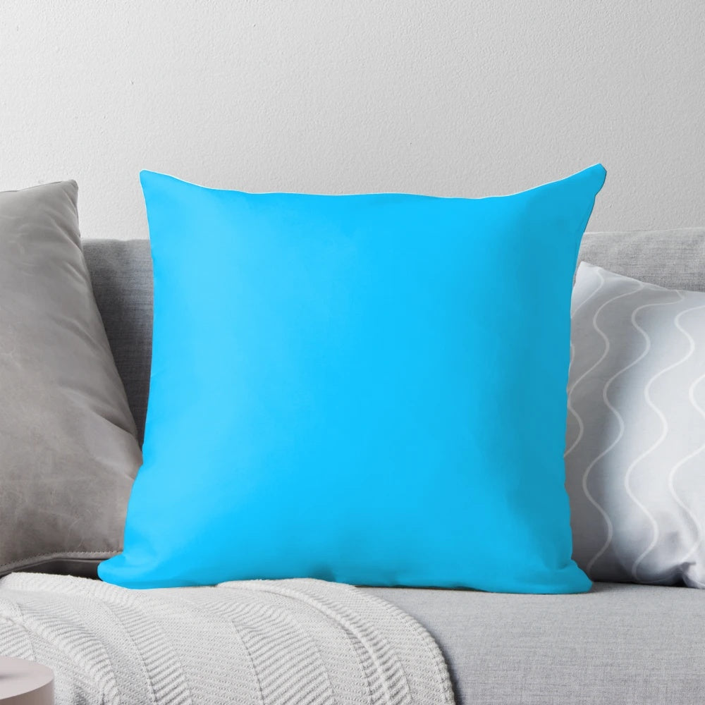 Deep sky blue solid color pillow with a plain, monochrome design