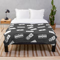 Dominoes-patterned plush blanket with number designs