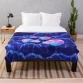 Dreamy nautilus plush blanket with deep sea and underwater designs