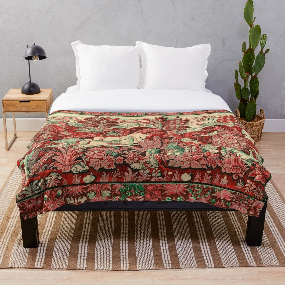 Plush blanket with antique French tapestry design featuring fantasy woodland creatures