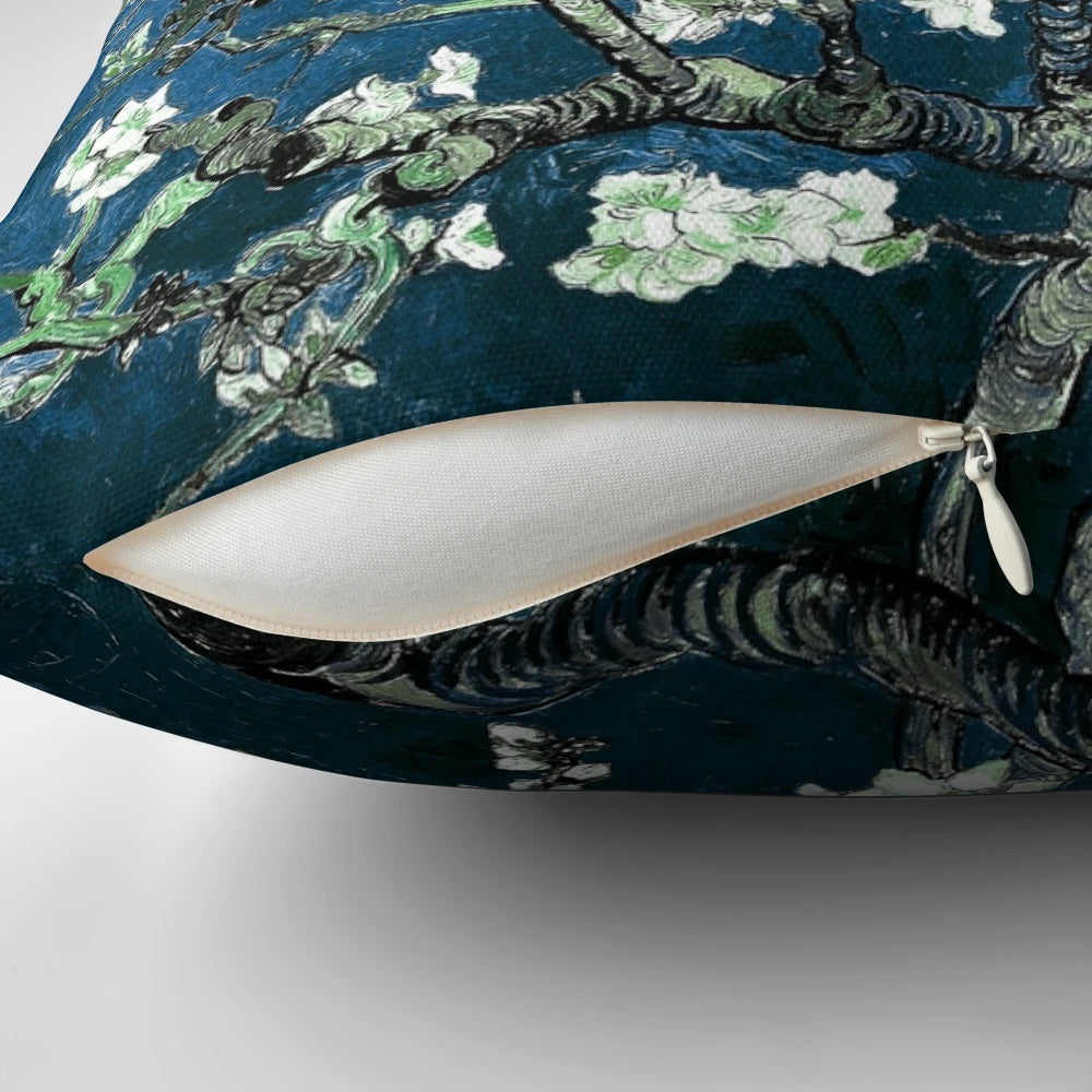 Vibrant blue pillow featuring Van Gogh's iconic Almond Blossoms painting
