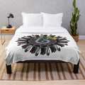 Designer's plush blanket with a vibrant floral pattern