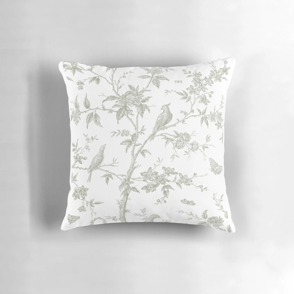 Decorative throw pillow with a vintage French toile pattern in a beautiful sage green color