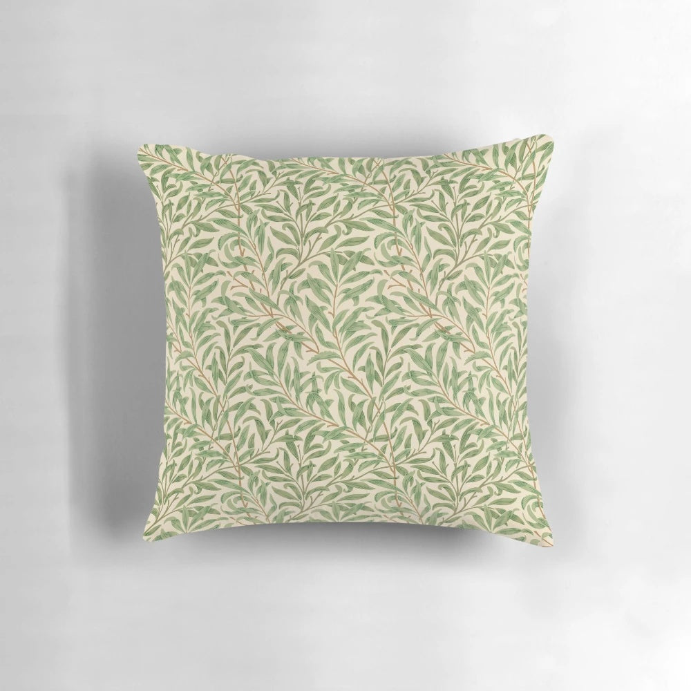 A vintage-inspired pillow featuring a willow tree leaves pattern, perfect for a natural, earthy decor.