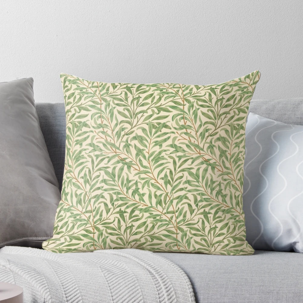 A vintage-inspired pillow featuring a willow tree leaves pattern, perfect for a natural, earthy decor.