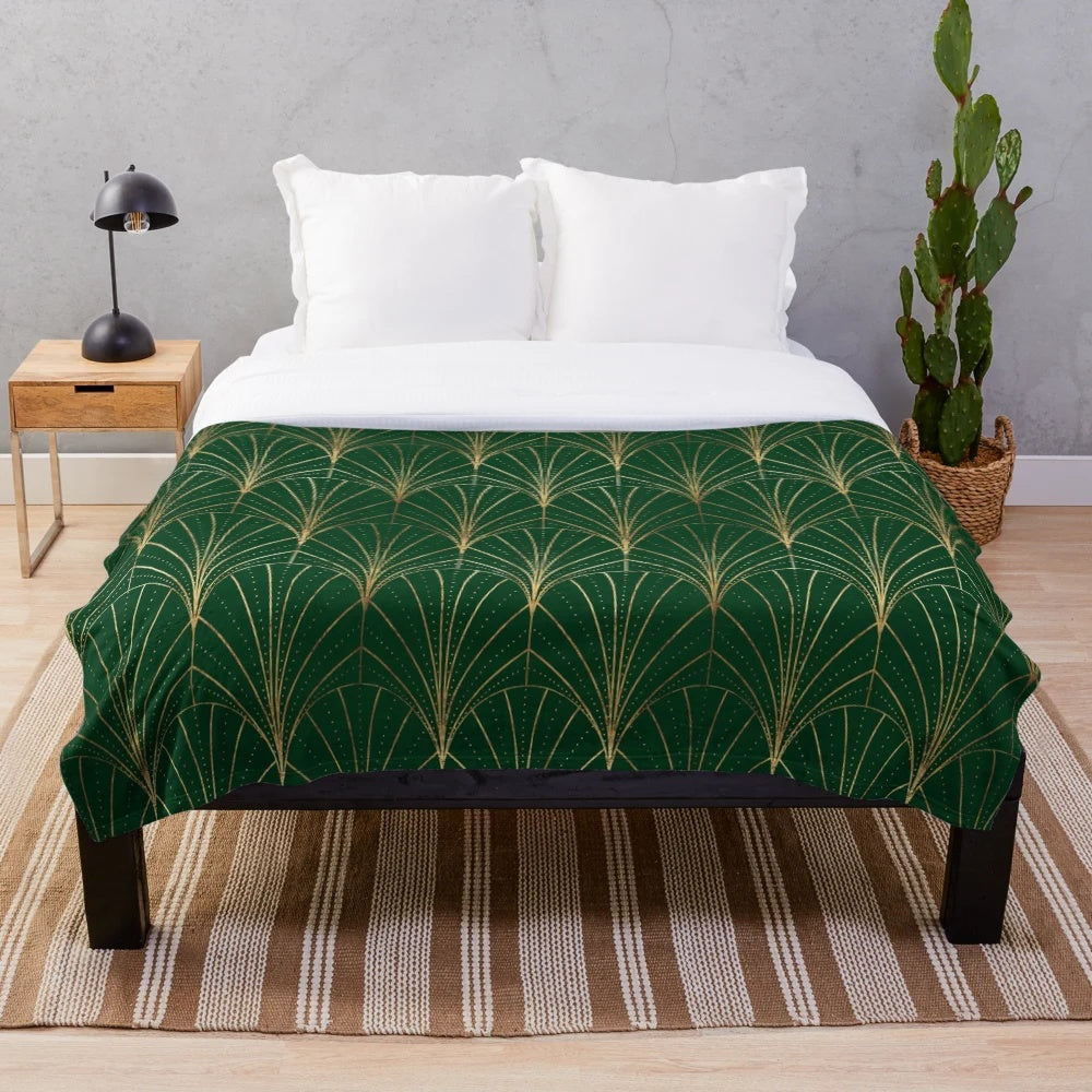 Emerald green plush blanket with a symmetrical art deco waterfalls pattern