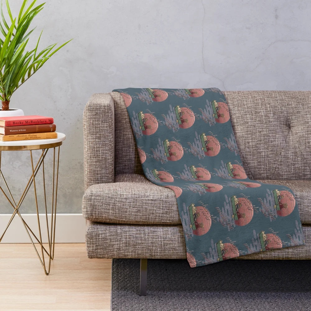 Cozy plush blanket featuring the Muppets character Emmet Otter
