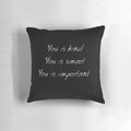 Minimalist pillow with the empowering quote 'You is kind, smart, important' from 'The Help' movie