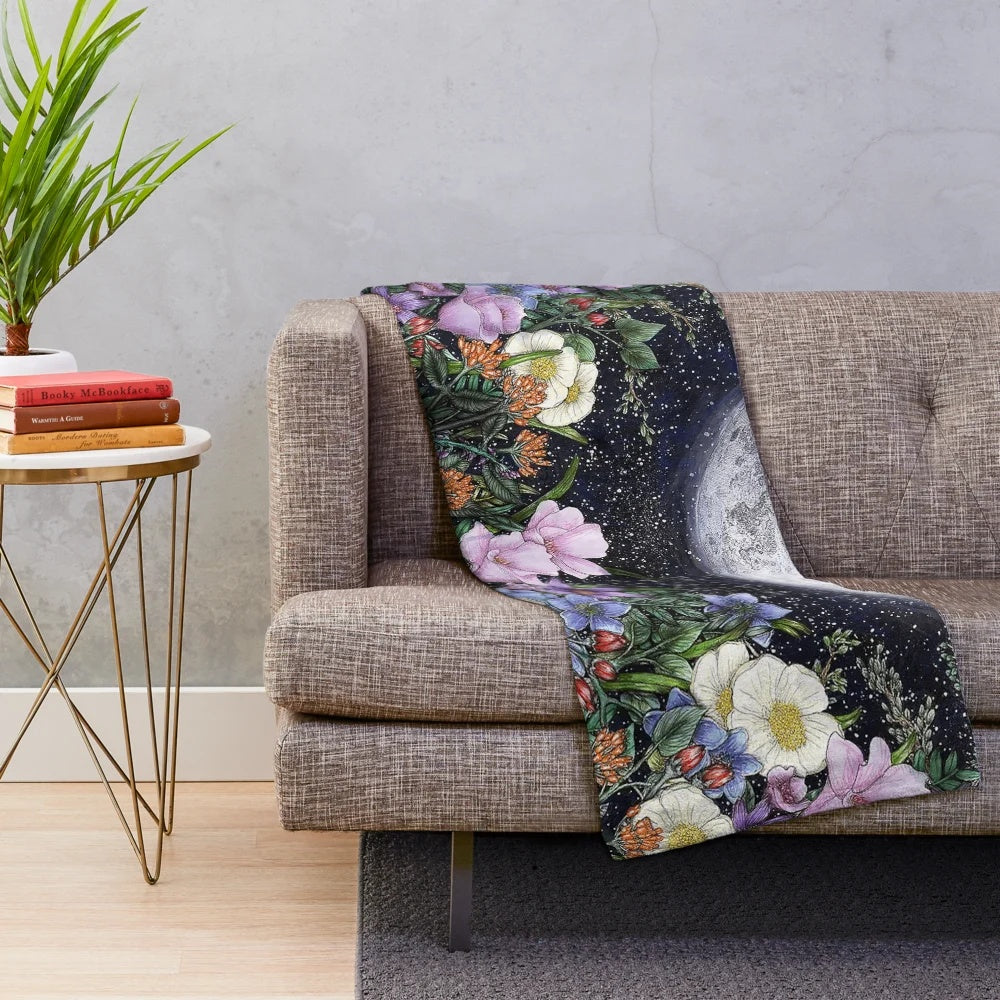 Plush blanket featuring a pen and ink illustration of a magical midnight garden scene with a glowing moon, flowers, and trees