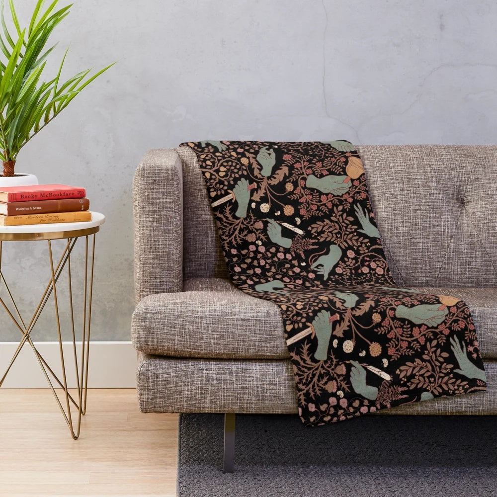 Plush blanket with an enchanted hand pattern design