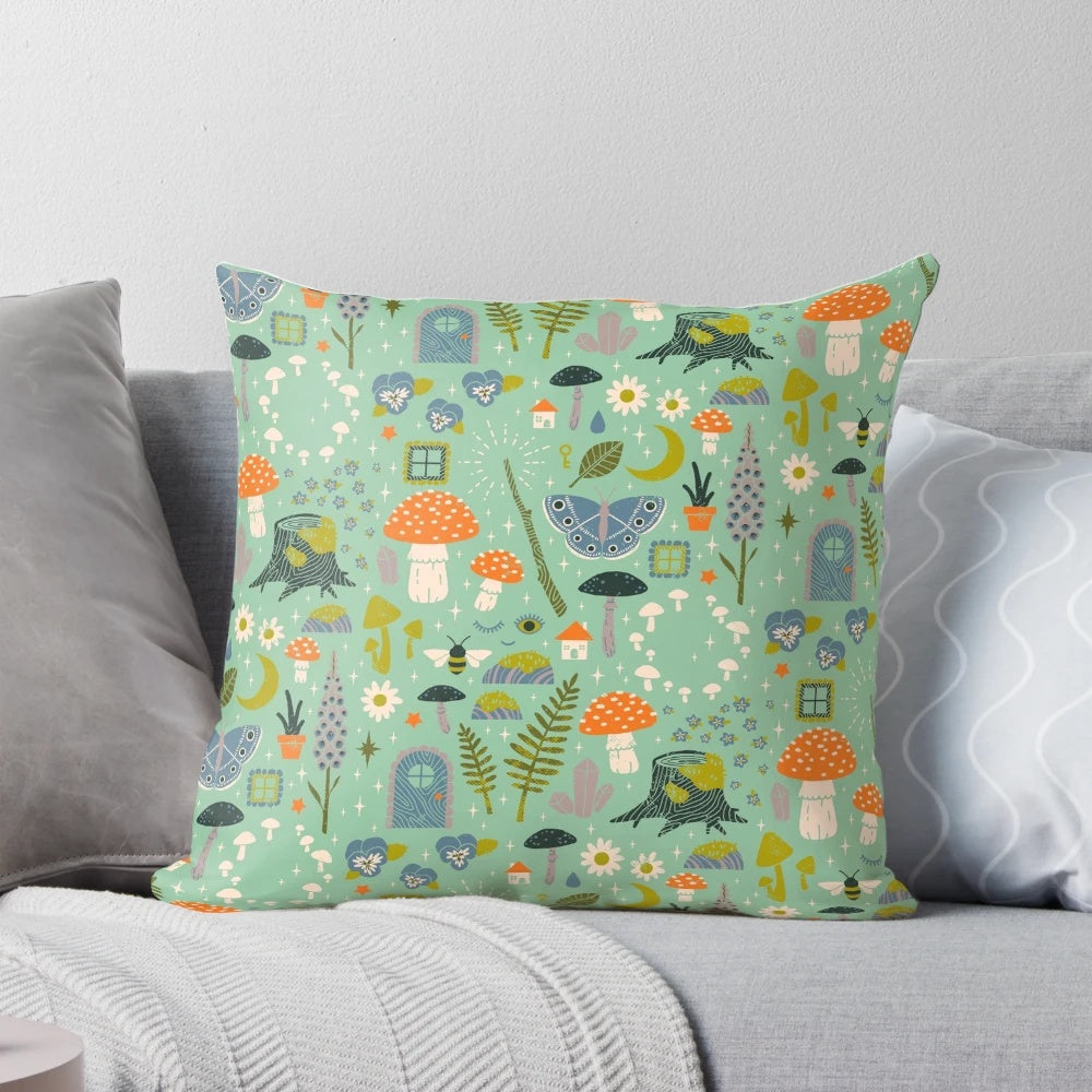 Whimsical fairy garden-inspired throw pillow with mint, pastel, and floral motifs