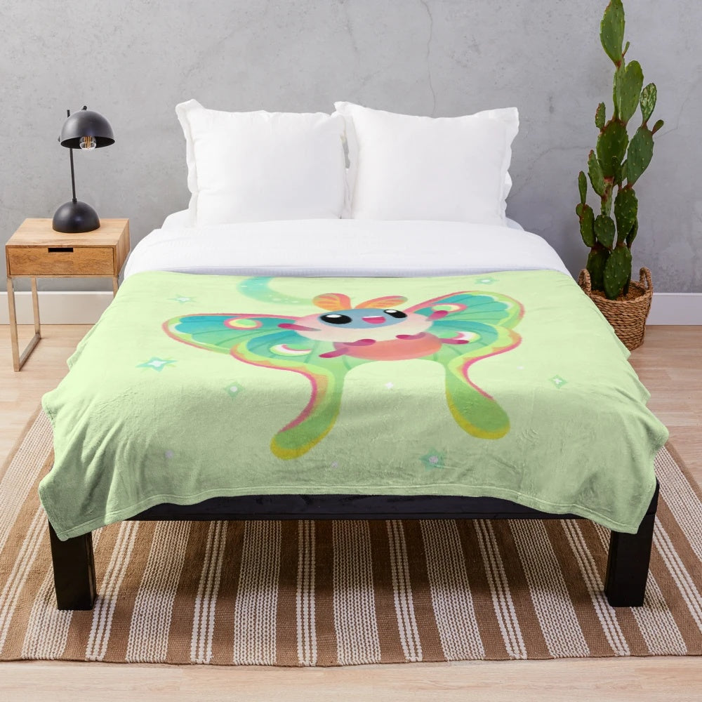Soft and cuddly luna moth plush blanket, perfect for nature lovers