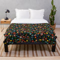 Midnight floral plush blanket with mythical creatures and elegant flourishes