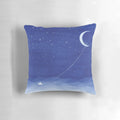 Serene watercolor painting of a sailboat on the moonlit ocean, featured on a soft, plush pillow