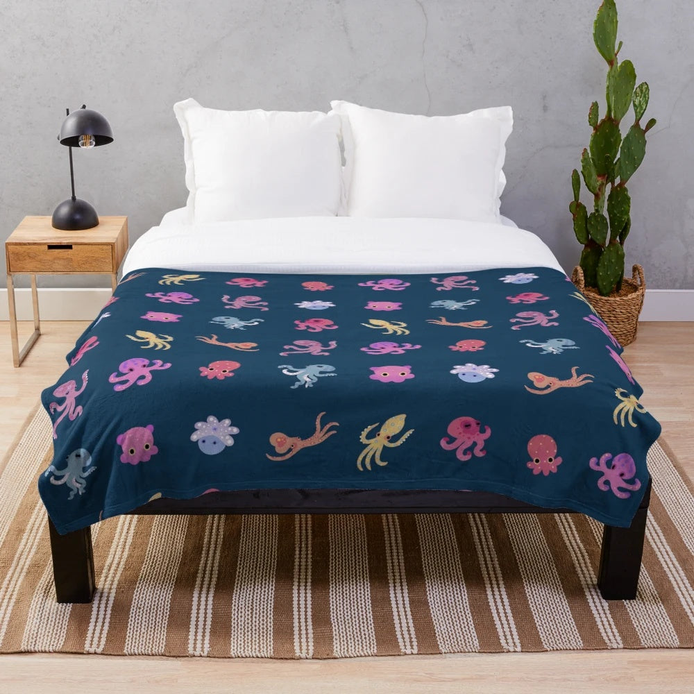 Dark octopus plush blanket with marine life pattern