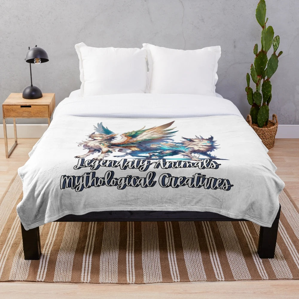 Plush blanket with illustrations of fantastical creatures like unicorns, dragons, and griffins