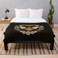 Cozy plush blanket featuring a magical moon and honeycomb design