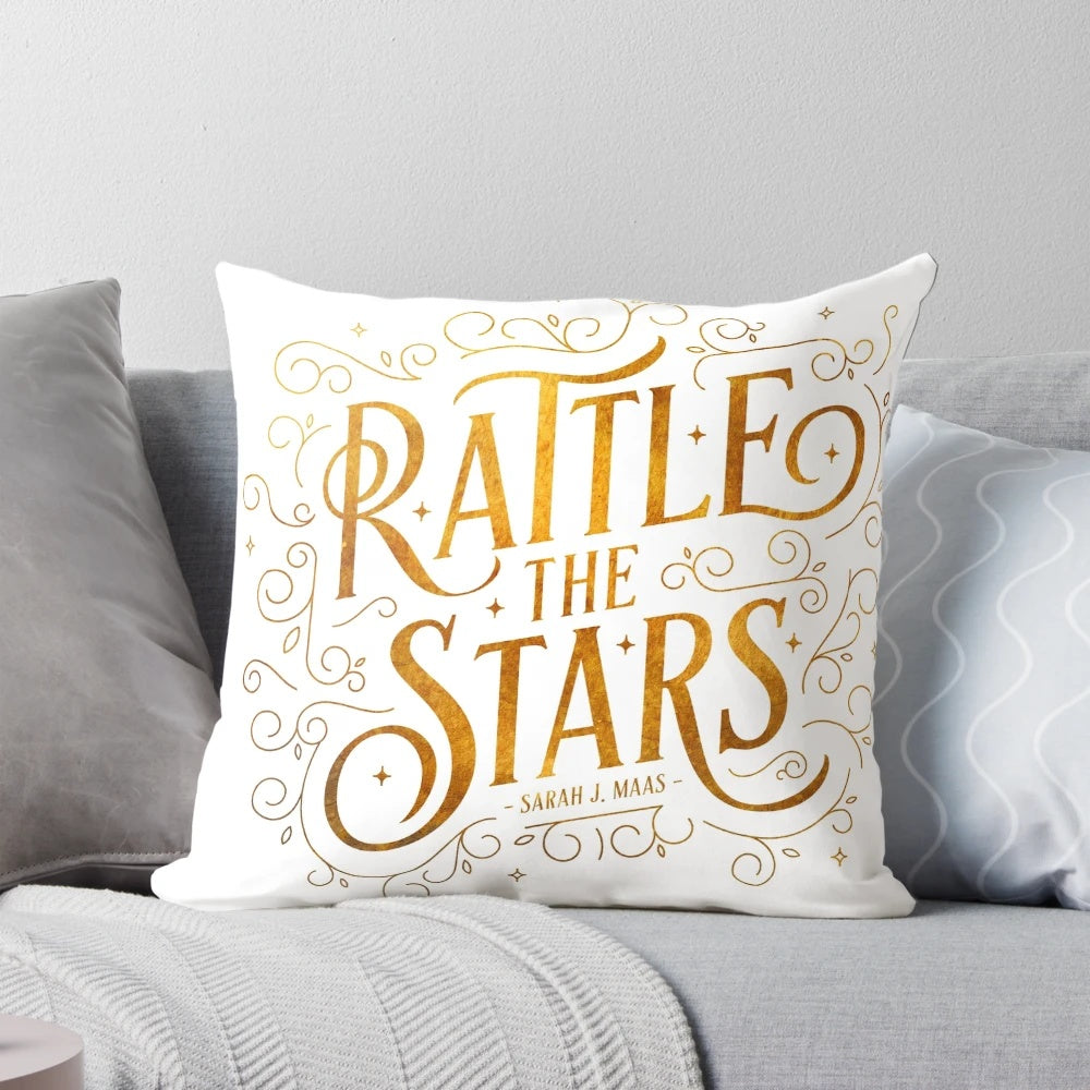 Gold and swirling "Rattle the Stars" decorative pillow with a vintage, art-inspired design