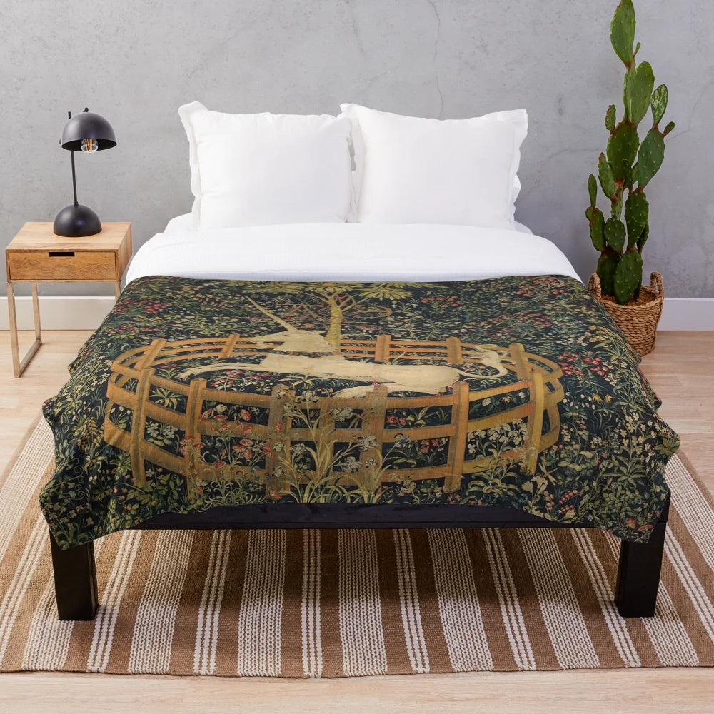Plush blanket featuring the iconic "Unicorn in Captivity" fantasy artwork