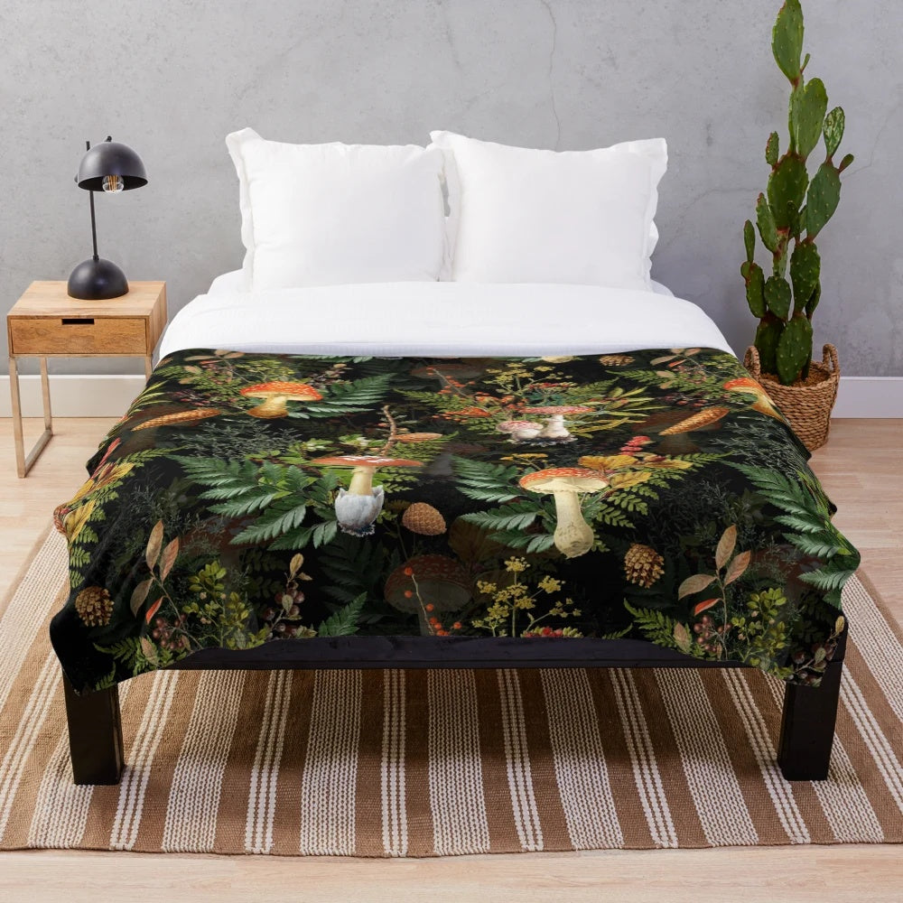Vintage botanical plush blanket featuring midnight toadstools in a forest setting