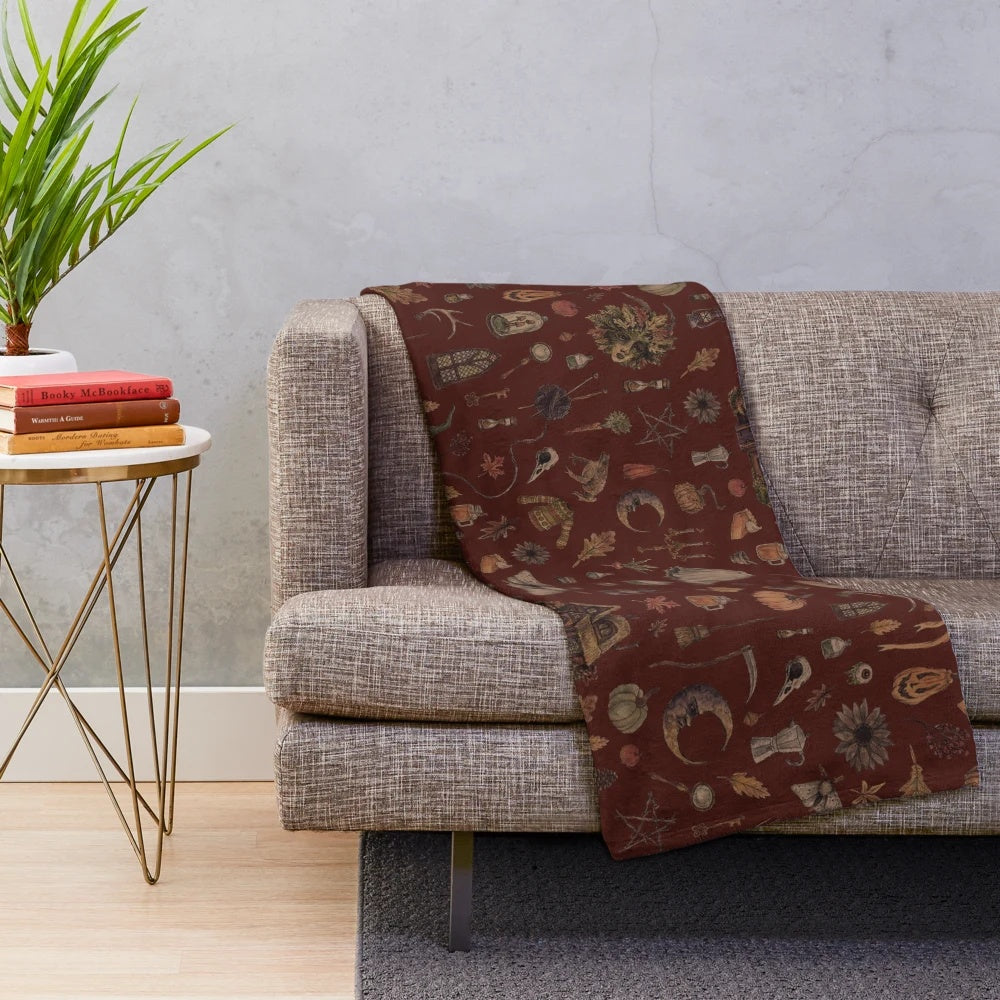 Cozy plush blanket with witchy, autumn-inspired design