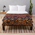 Ethnic tribal print plush blanket with abstract African inspired design