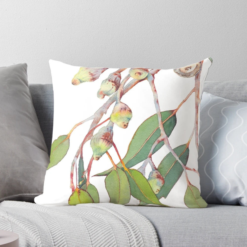 Vibrant watercolor illustration of an Australian eucalyptus tree branch on a high-quality throw pillow.