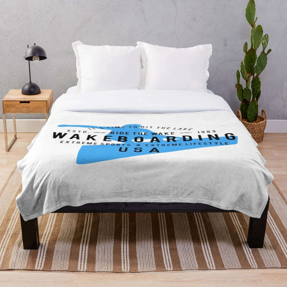 Wakeboarding plush blanket with extreme sports design