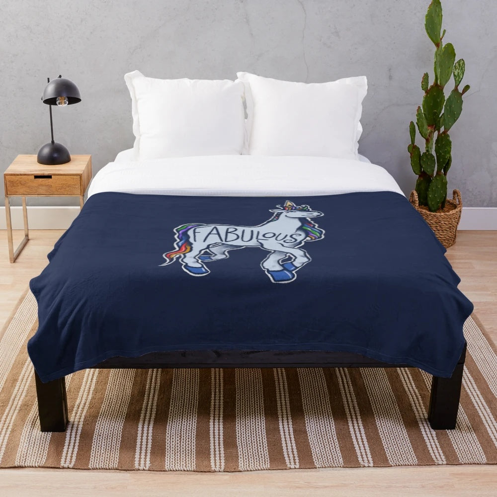 Fabulous unicorn plush blanket with rainbow design