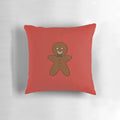 Plush gingerbread man shaped holiday pillow for Christmas and winter home decor