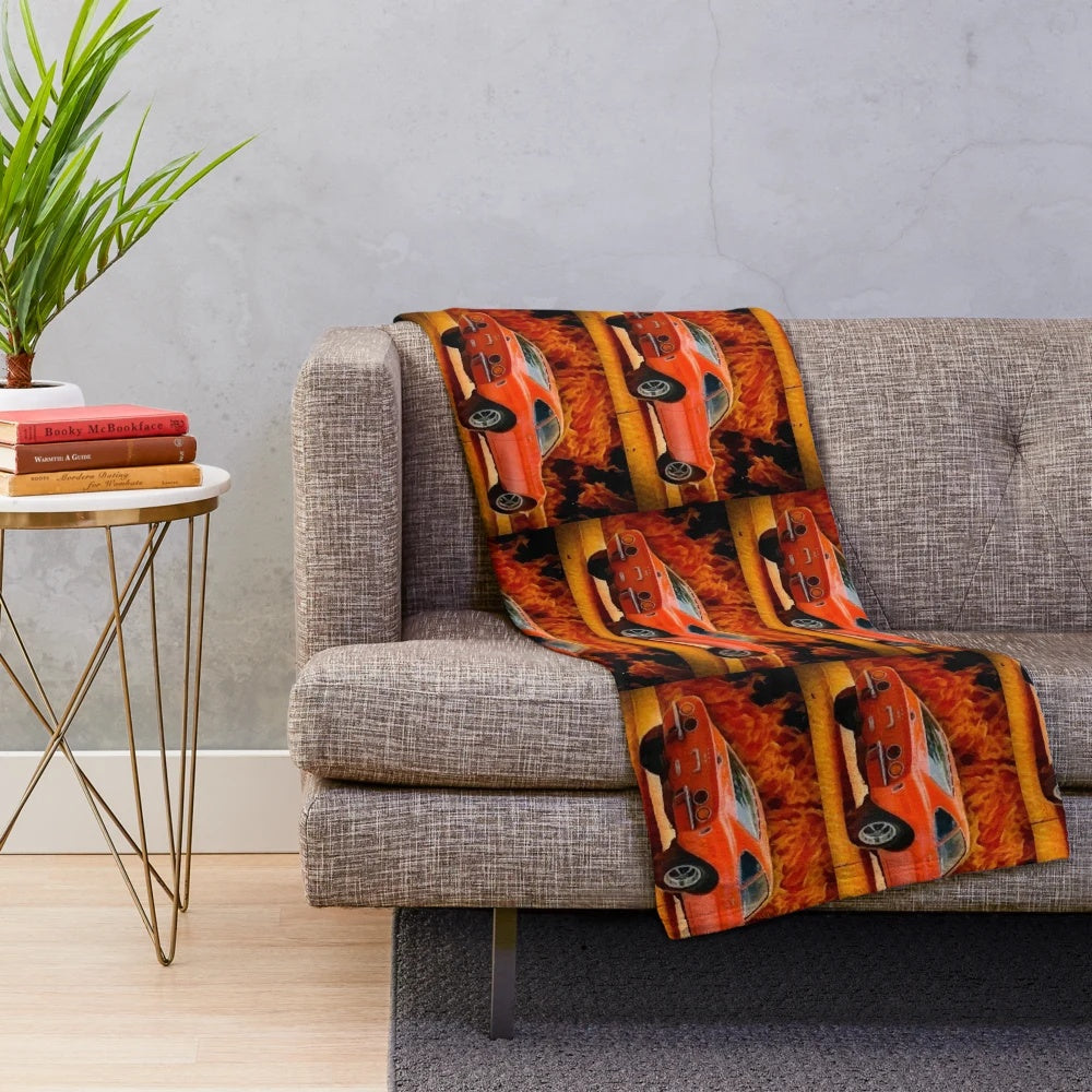 Plush blanket with fiery Opel-inspired design