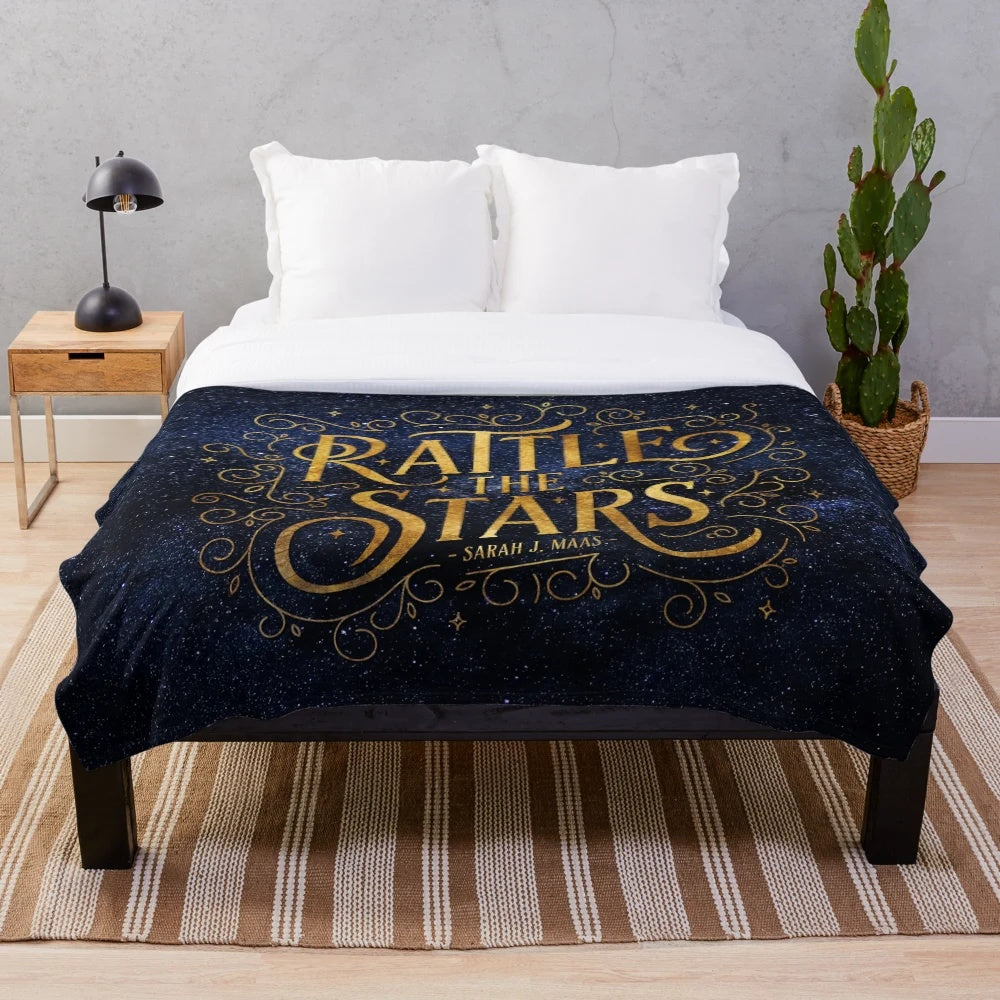 Galaxy-inspired plush blanket with starry night sky design