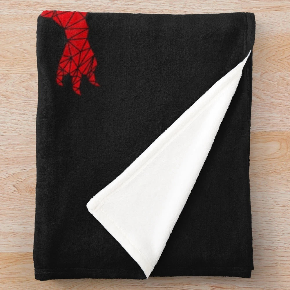 Soft, plush geometric blanket featuring the iconic Welsh dragon design in red and white.