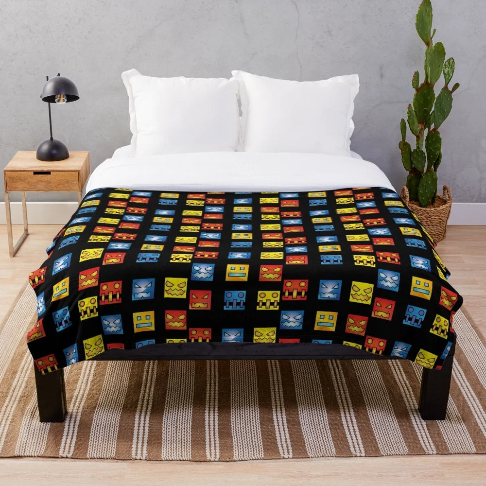 Geometry Dash themed plush blanket with geometric design