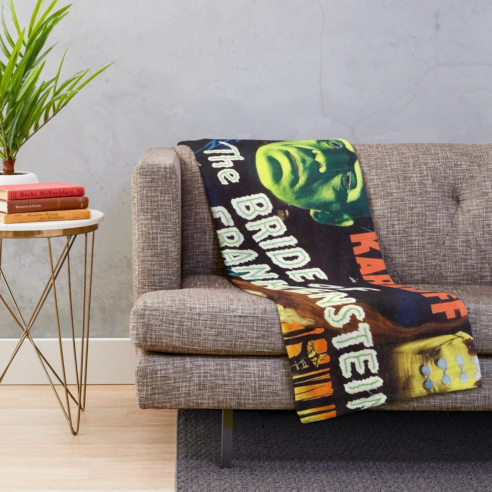 Bride of Frankenstein inspired plush blanket with classic horror movie imagery