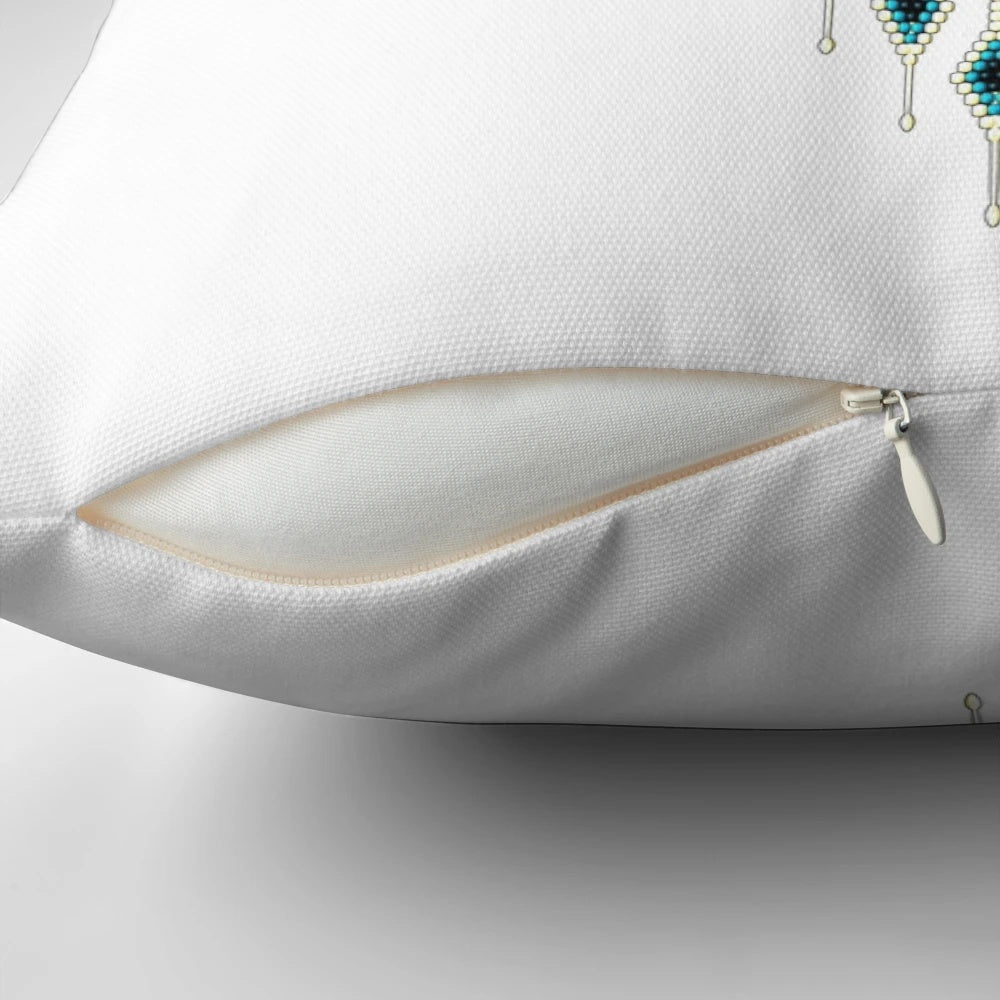 A beautiful handmade native american southwest-style turquoise thunderbird pillow