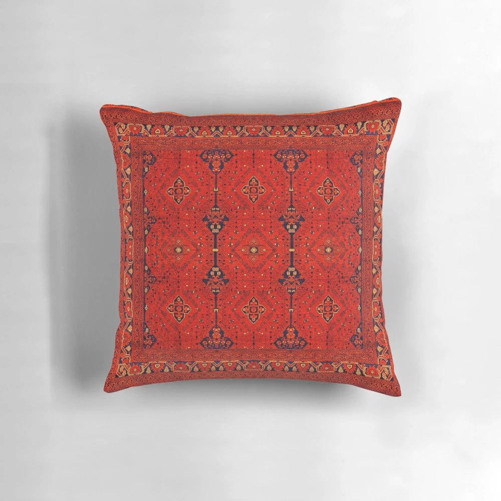 Vibrant red and patterned Moroccan-style boho pillow with traditional heritage design