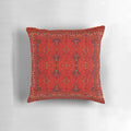Vibrant red and patterned Moroccan-style boho pillow with traditional heritage design