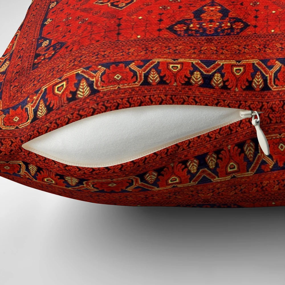 Vibrant red and patterned Moroccan-style boho pillow with traditional heritage design