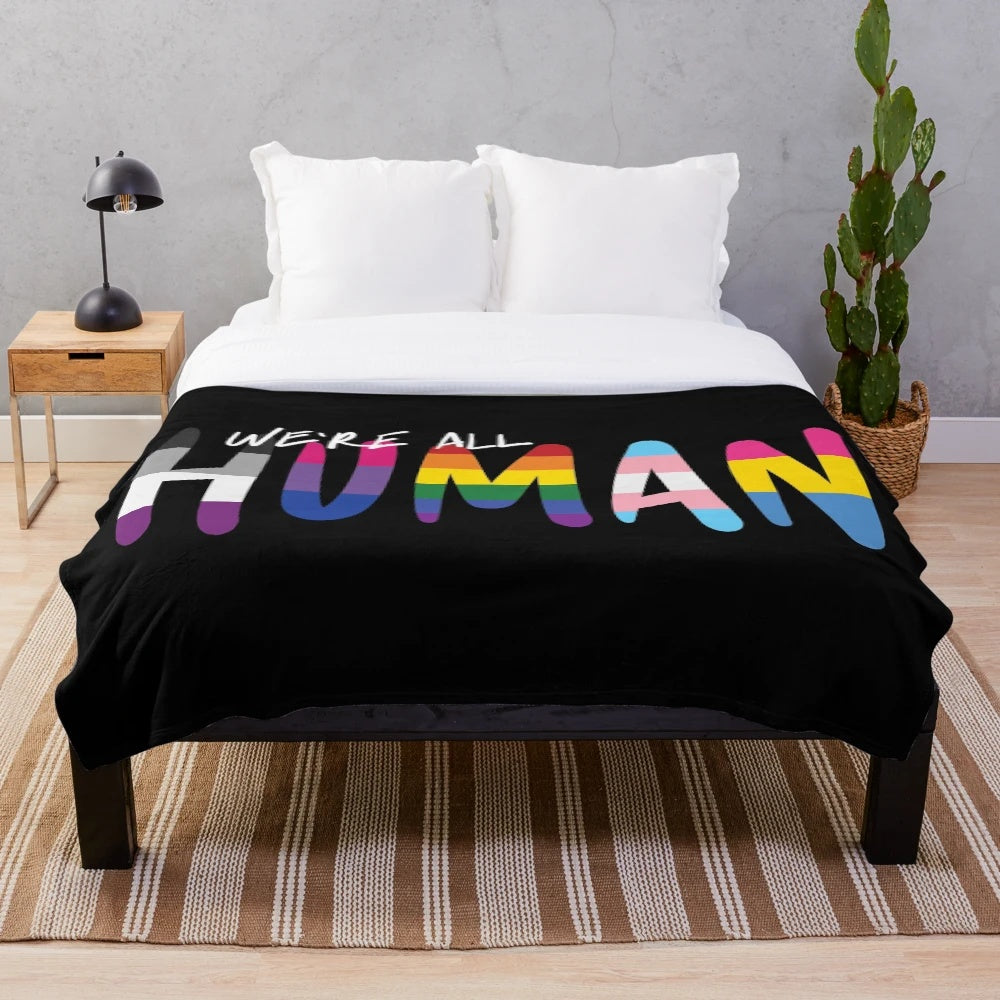 Handwritten flags plush blanket featuring a colorful striped pattern