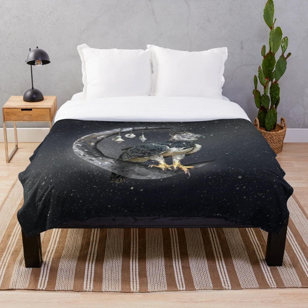 Harpy eagle plush blanket with a nocturnal wildlife design