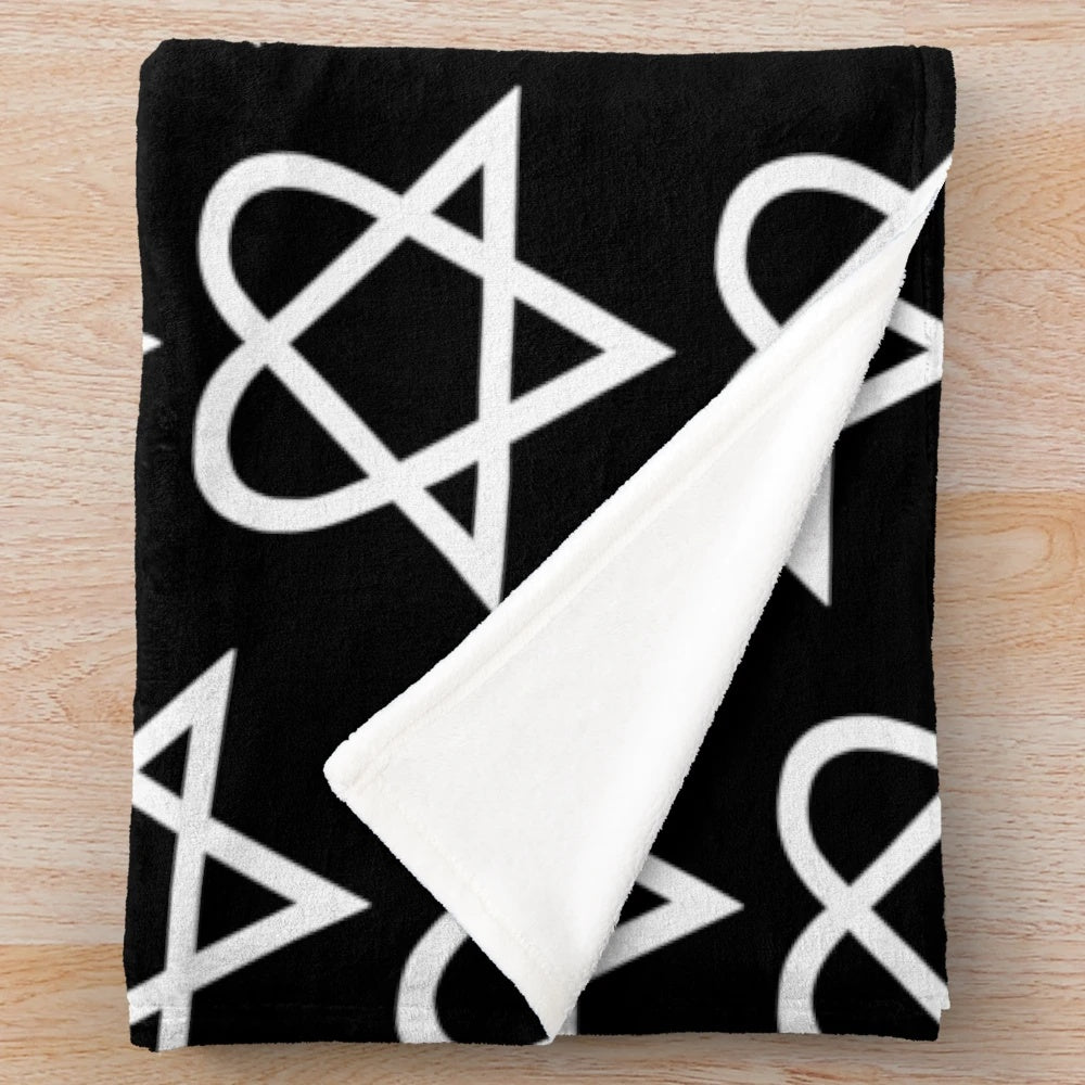 Heartagram plush blanket with a white and black design