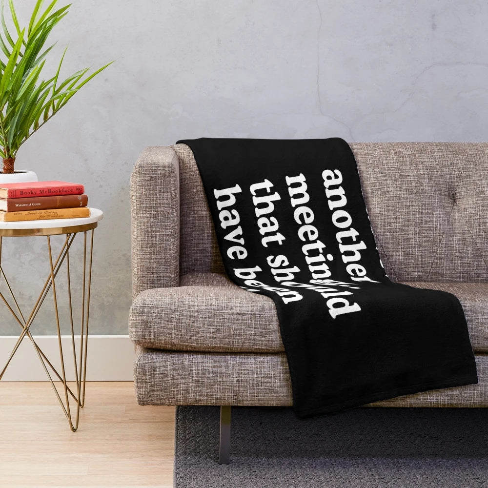 Plush blanket with text "I Survived Another Meeting That Should Have Been An Email