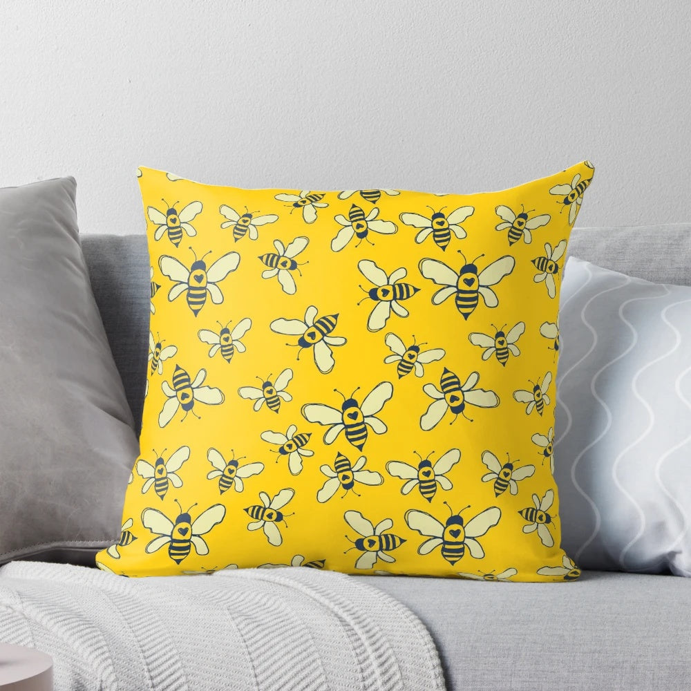 Honey Makers Pillow featuring a design of bees and honeycomb