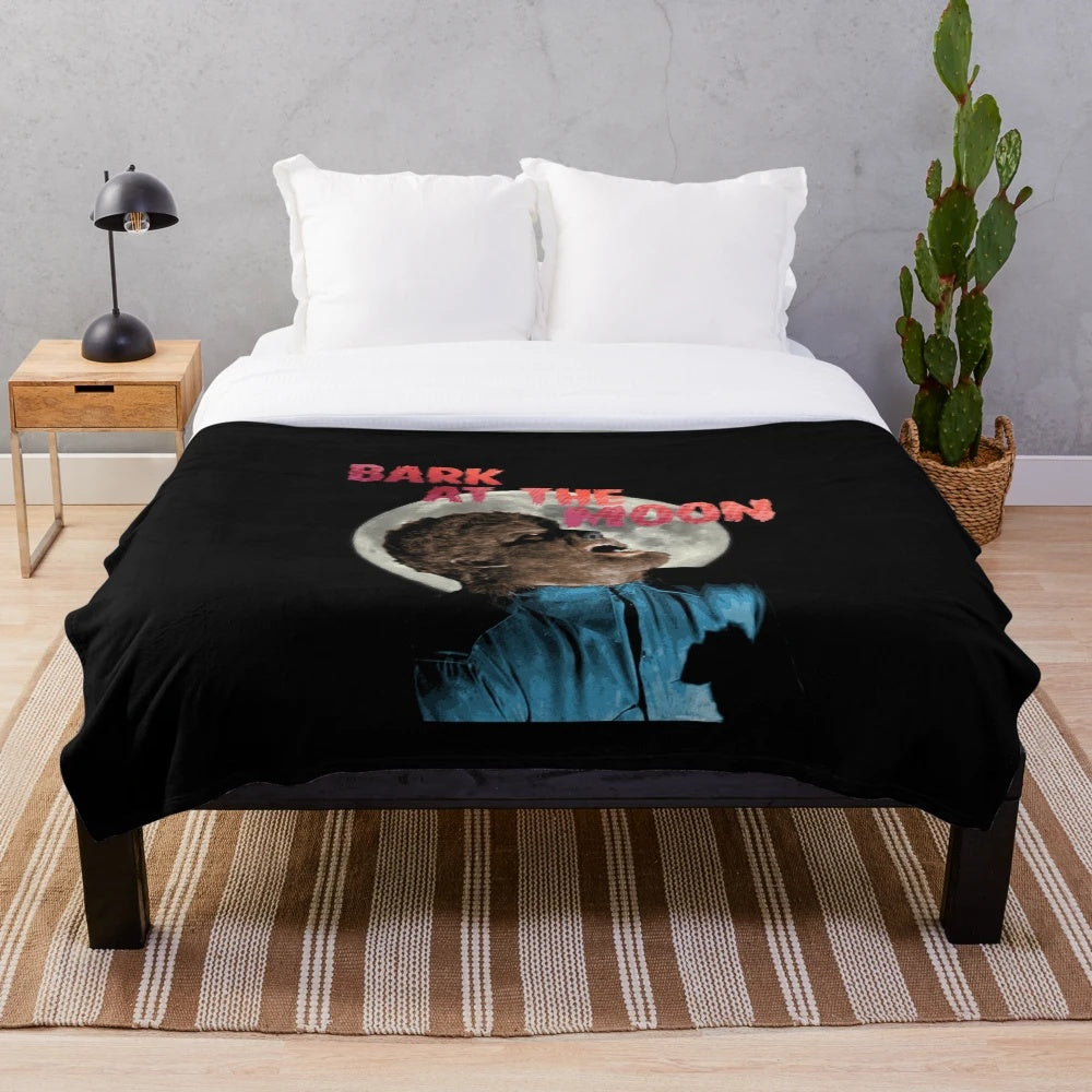 Howling werewolf plush blanket with a dark, retro horror-inspired design featuring a full moon.