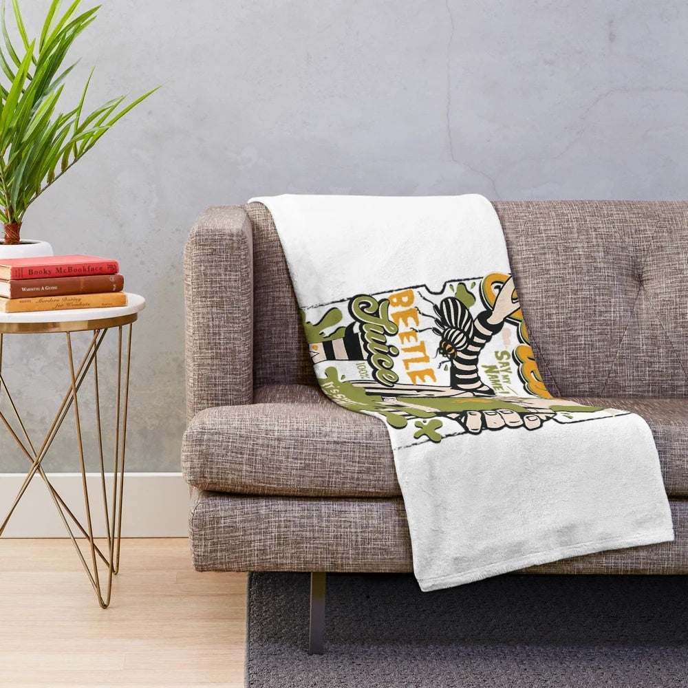 Beetlejuice inspired plush blanket with the iconic character design
